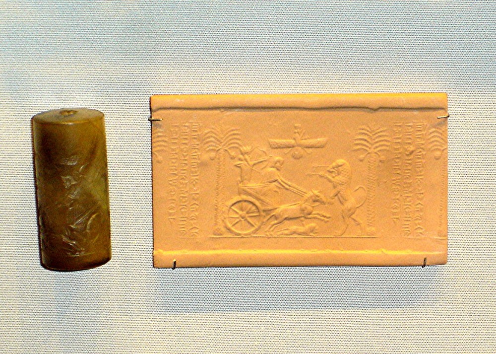 Cylindrical seal with Darius in chariot shooting arrows at a lion (British Museum)